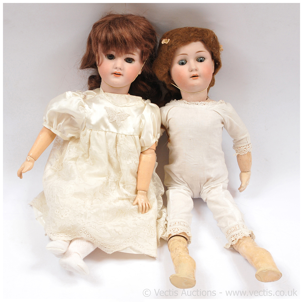 PAIR inc Pair of antique bisque dolls