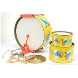 Chad Valley "The Smurfs" tinplate/plastic drum kit comprising of 3 x drums with sticks plus cymbal,