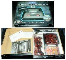 A boxed Sega Mega Drive II. See photo.