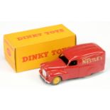 Dinky 471 Austin Van "Nestle's" red with yellow rigid hubs