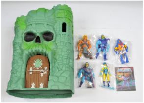 Quantity of modern Mattel Masters of the Universe action figures and Castle Grayskull play area