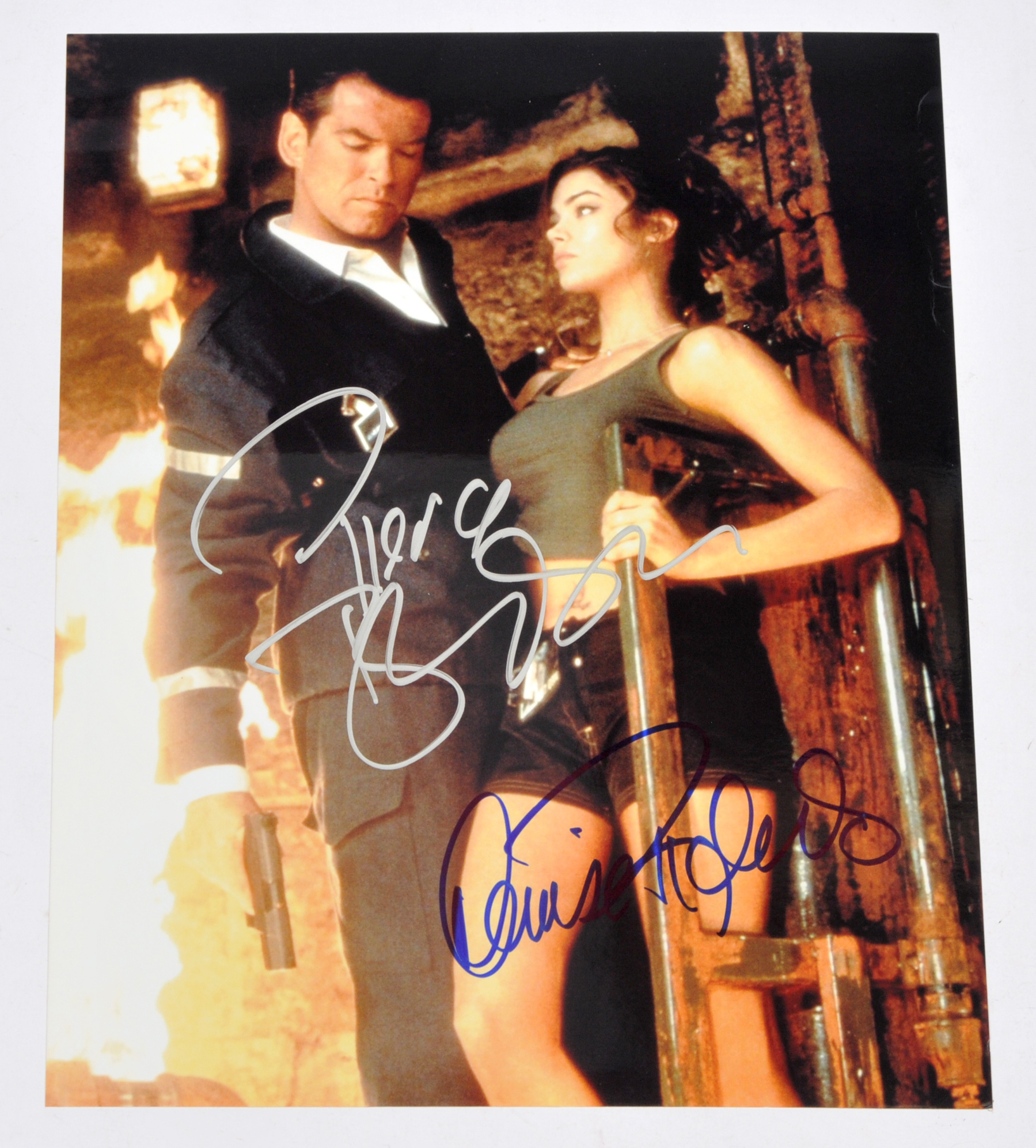 Pierce Brosnan and Denise Richards signed photo