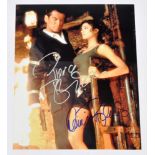 Pierce Brosnan and Denise Richards signed photo