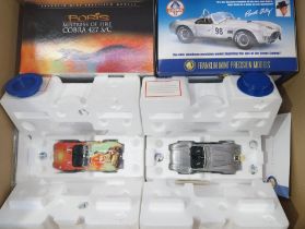 Franklin Mint. A boxed pair of 1:24 scale Shelby Cobra models