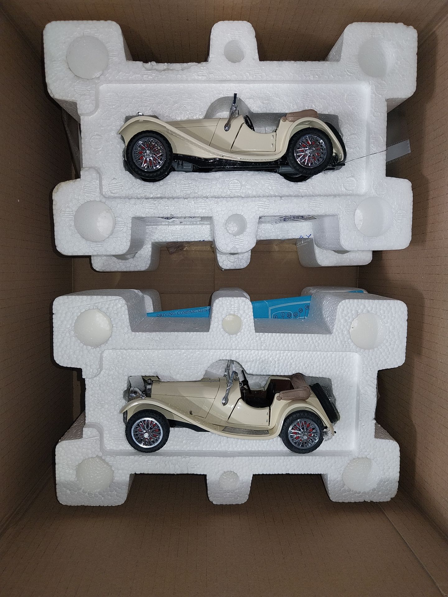 Franklin Mint, a partially boxed (Polystyrene only) pair of 1:24 scale 1938 Jaguar SS-100 models