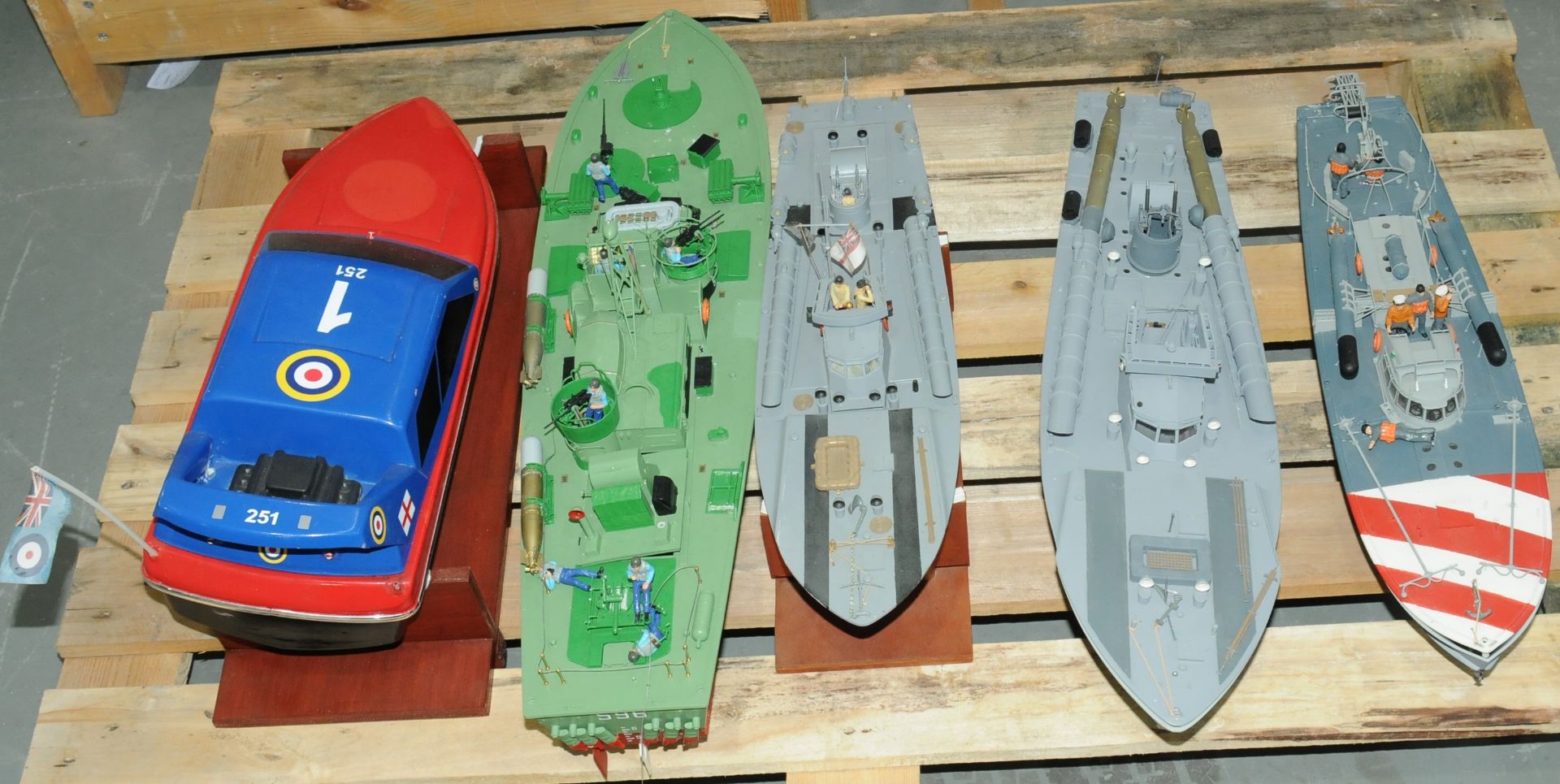Italeri & Similar a group of boats with motorized engines 