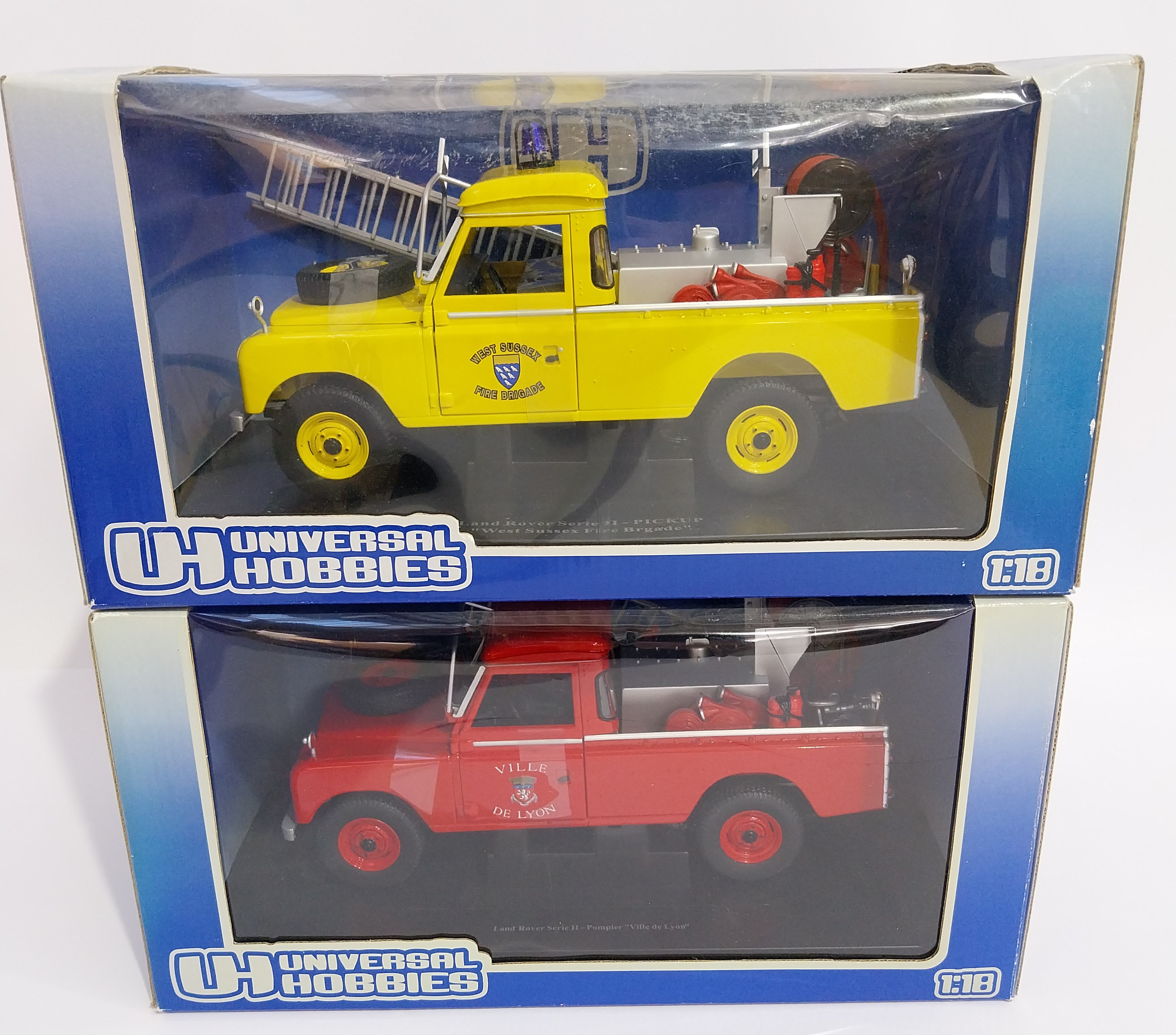 UH Universal Hobbies, a boxed pair of Landrover models