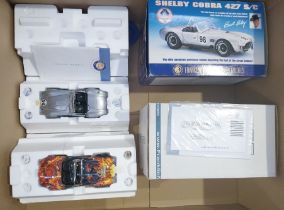 Franklin Mint. A boxed pair of 1:24 Shelby Cobra models