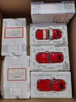 Franklin Mint, a partially boxed 1961 Jaguar E-Type Coupe models