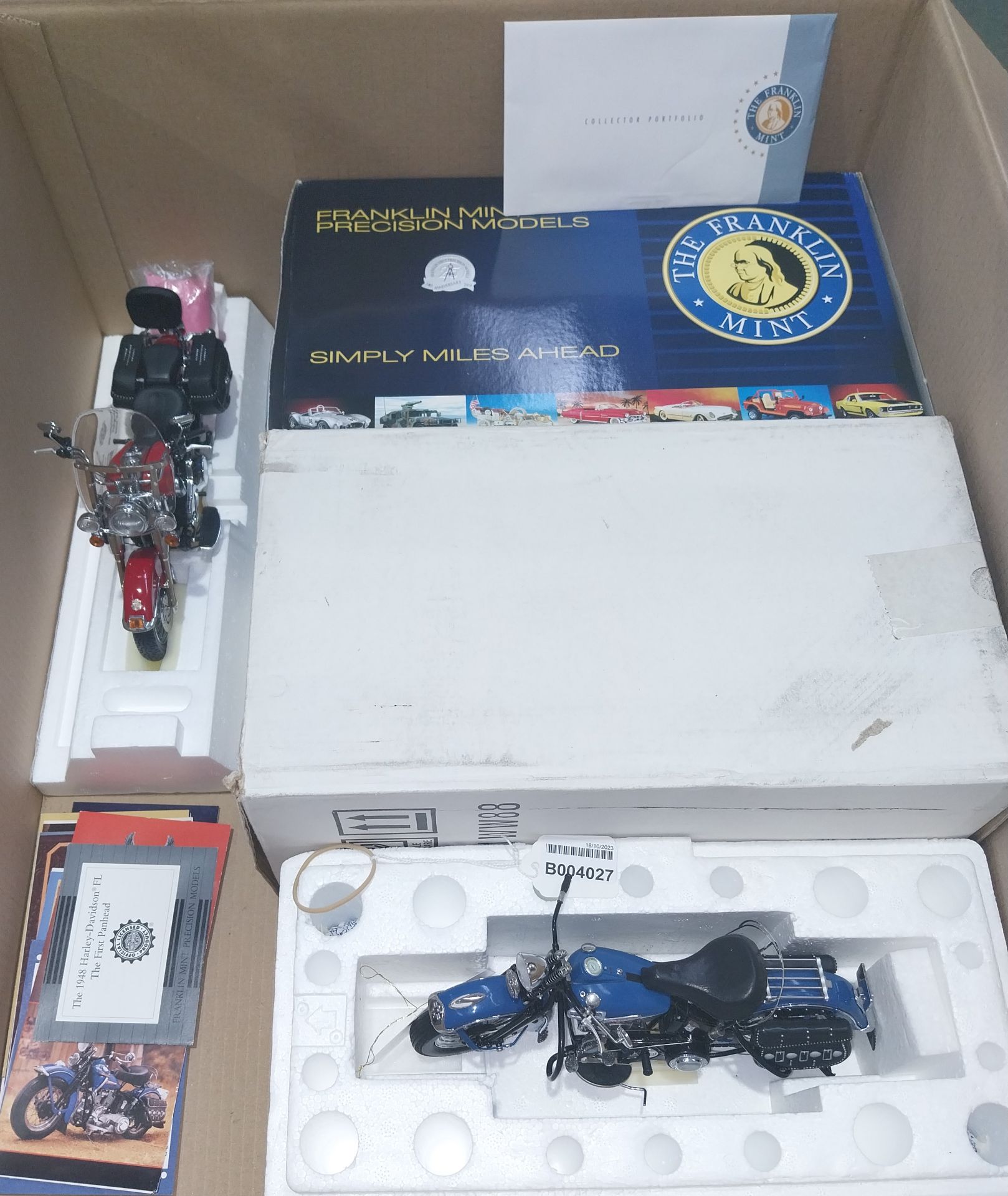 Franklin Mint, a partially boxed pair of 1:10 Harley Davidson Motorcycles