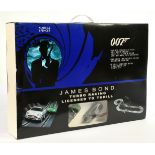 Carrera set James Bond turbo racing licensed to thrill to include Aston Martin Vanquish and Jagua...