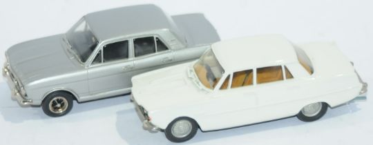 An unboxed pair of White Metal models comprising of 