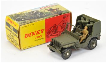 French Dinky 828 Jeep with rocket launcher - drab green including concave hubs, figure driver