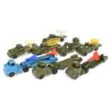 Tootsietoy military  group of  8 to include   - 3 x low loaders including rockets 