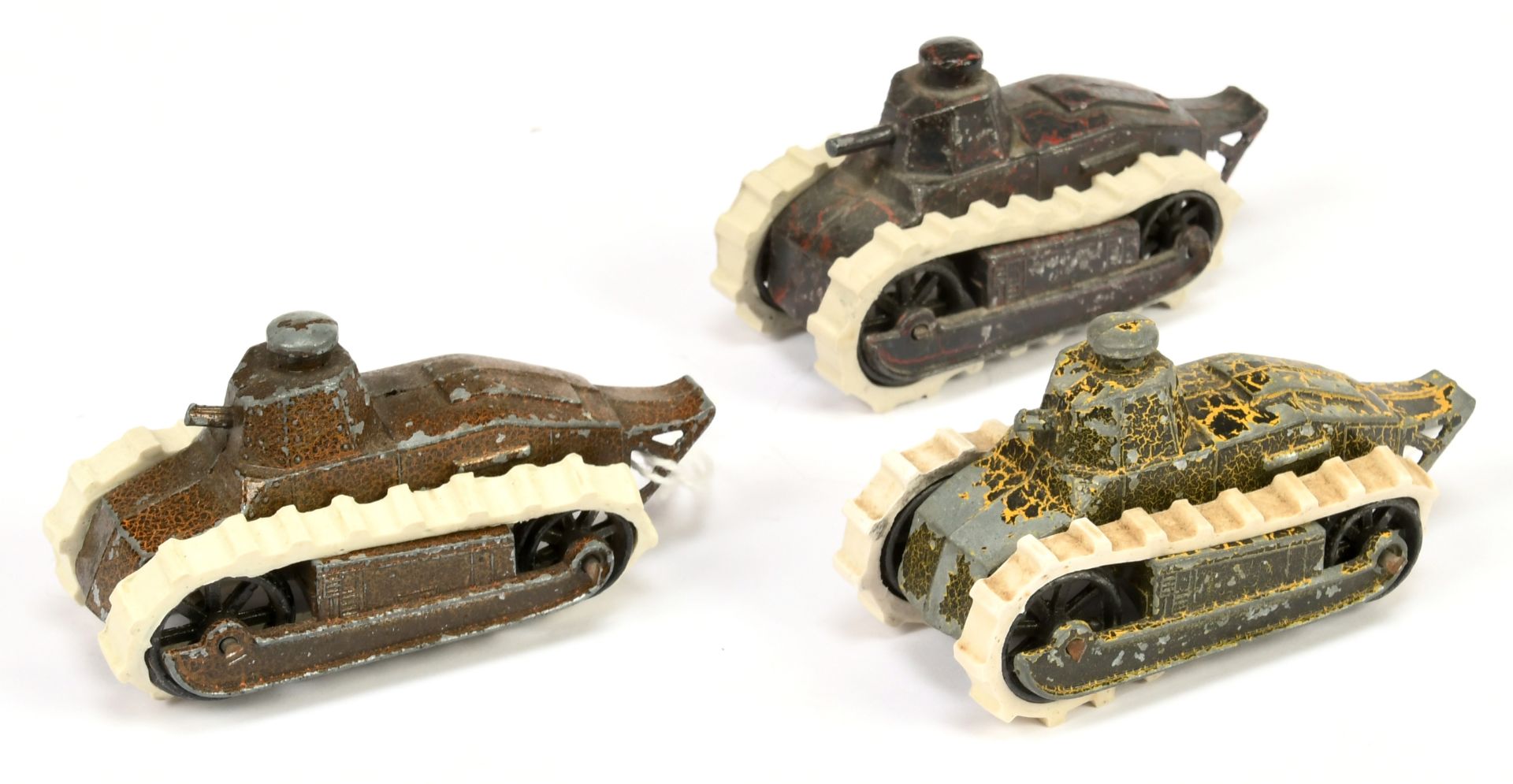 Tootsietoy group of 3 Renault Tanks - (1) black , yellow,(2) dark brown (3) dark, yellow purple 