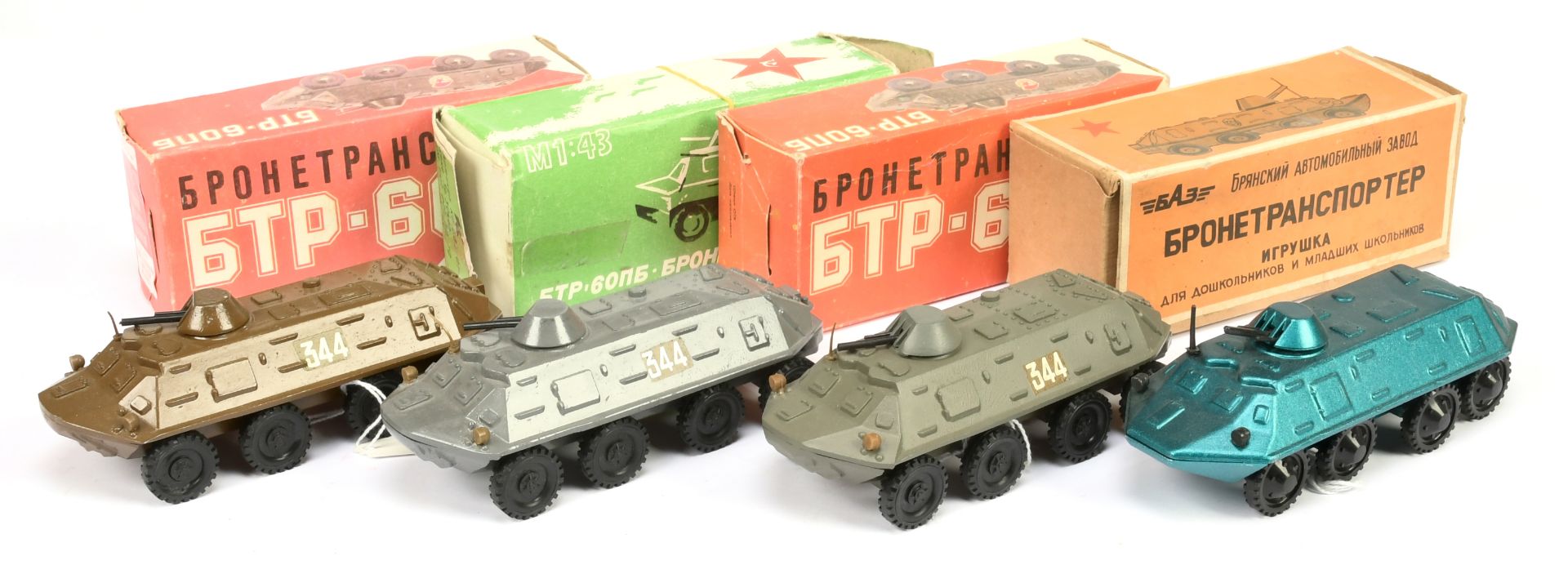 Russain made group of 4 Armoured cars (1/43rd) scale - (1) metallic sea-green, (2) brown