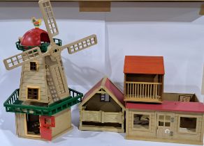 Sylvanian Families a mixed group to include a mixture of buildings, accessories and characters wi...