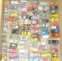 A qty of unboxed cars of mixed manufactures