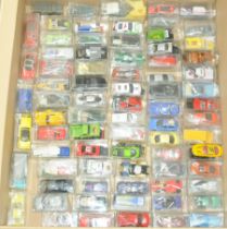 A qty of unboxed cars of mixed manufactures