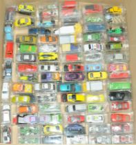 A qty of unboxed cars of mixed manufactures