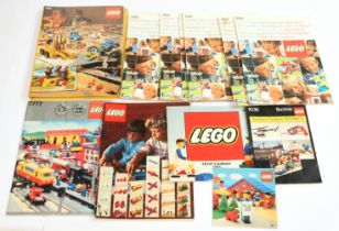 Lego a group of original instruction booklets, includes some early sets - 555, 1036 Teachers Guid...