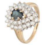 14K. Yellow gold entourage ring set with approx. 0.63 ct. synthetic sapphire and approx. 0.99 ct. di