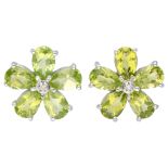 14K. White gold ear studs set with peridot.