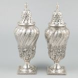 2-piece set of silver casters.