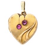 18K. Yellow gold heart-shaped Art Nouveau medallion pendant set with ruby and diamond.