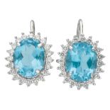 14K. White gold dormeuse earrings set with topaz and diamonds.