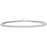 18K. White gold tennis bracelet set with approx. 2.75 ct. diamond.