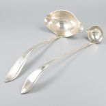 Soup laddle and bowl spoon silver.