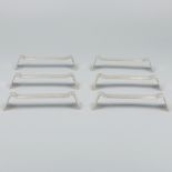 6-piece set of silver knife rests.