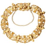 Antique 18K. yellow gold openwork bracelet with floral motifs.