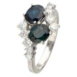 14K. White gold toi et moi ring set with 0.48 ct. natural sapphire and diamond.