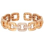 18K. Rose gold bangle bracelet set with approx. 0.97 ct. diamond.