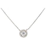18K. White gold necklace and halo pendant set with approx. 0.58 ct. diamond.
