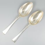 2-piece set vegetable serving spoons ''Haags Lofje'' silver.