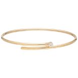 14K. Yellow gold bangle set with a diamond.