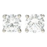 18K. White gold solitaire GIA certified ear studs with approx. 1.00 ct. diamond.