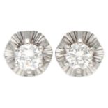 14K White gold ear studs set with approx. 0.20 ct. diamond.