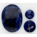 Lot of three cabochon cut natural sodalites.