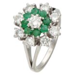 14K White gold entourage ring set with emerald and diamond.