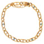 Vintage 18K yellow gold link bracelet set with seed pearls and blue stones.