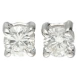 14K White gold solitaire ear studs set with approx. 2 x 0.35 ct. diamonds.