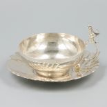 Cup & saucer silver.