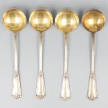 4-piece lot of silver pudding spoons.