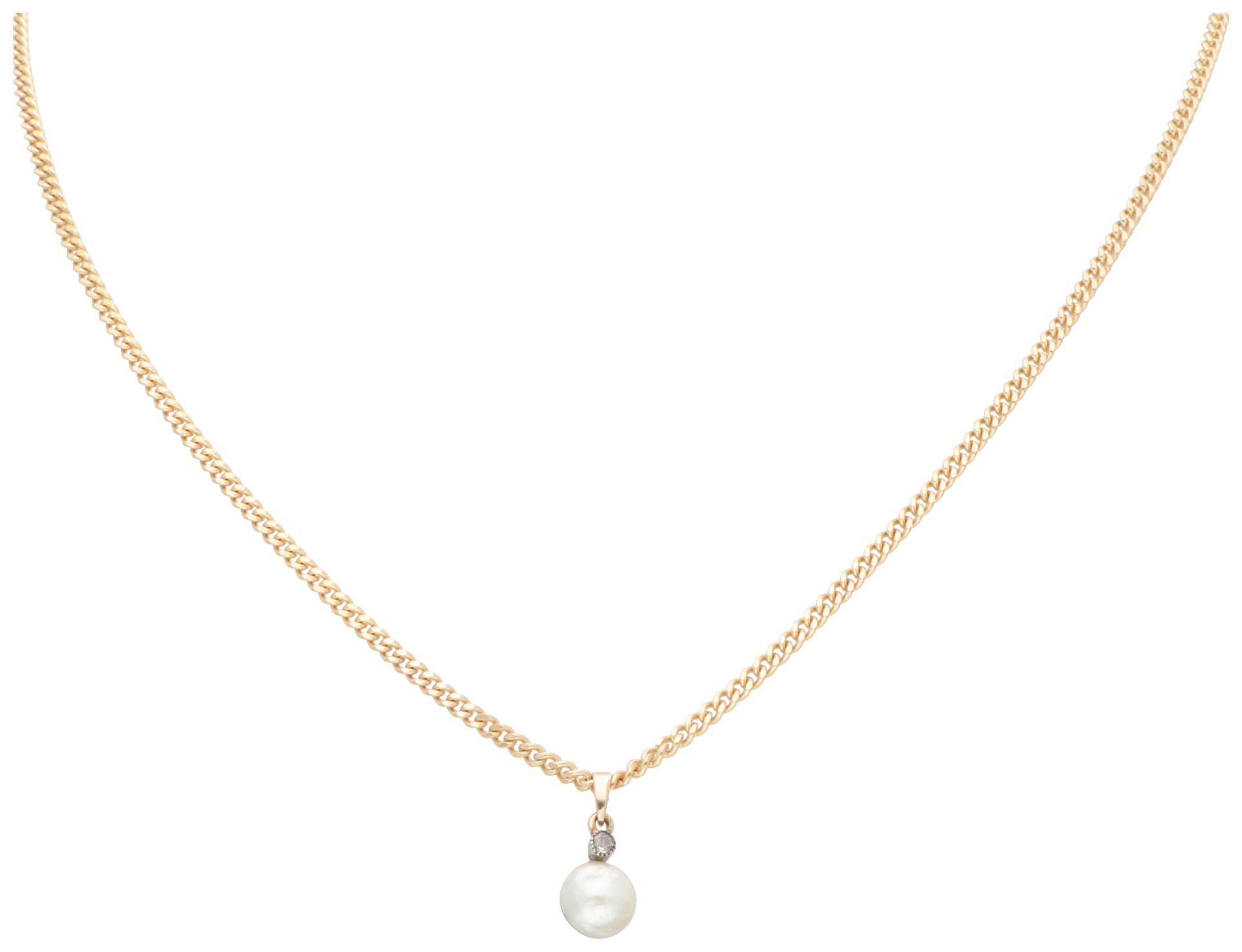 9K yellow gold gourmet necklace with half pearl and diamond pendant.