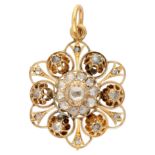 10K Yellow gold antique pendant with rose cut diamond on foil.