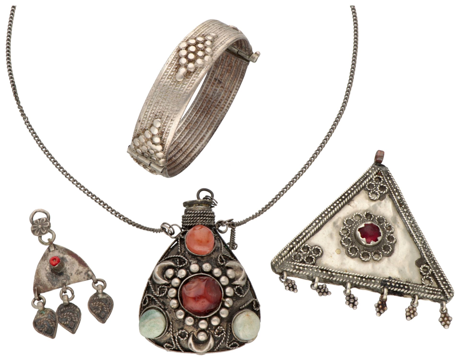 Medicine bottle set with various gemstones, silver bangle and pendants.